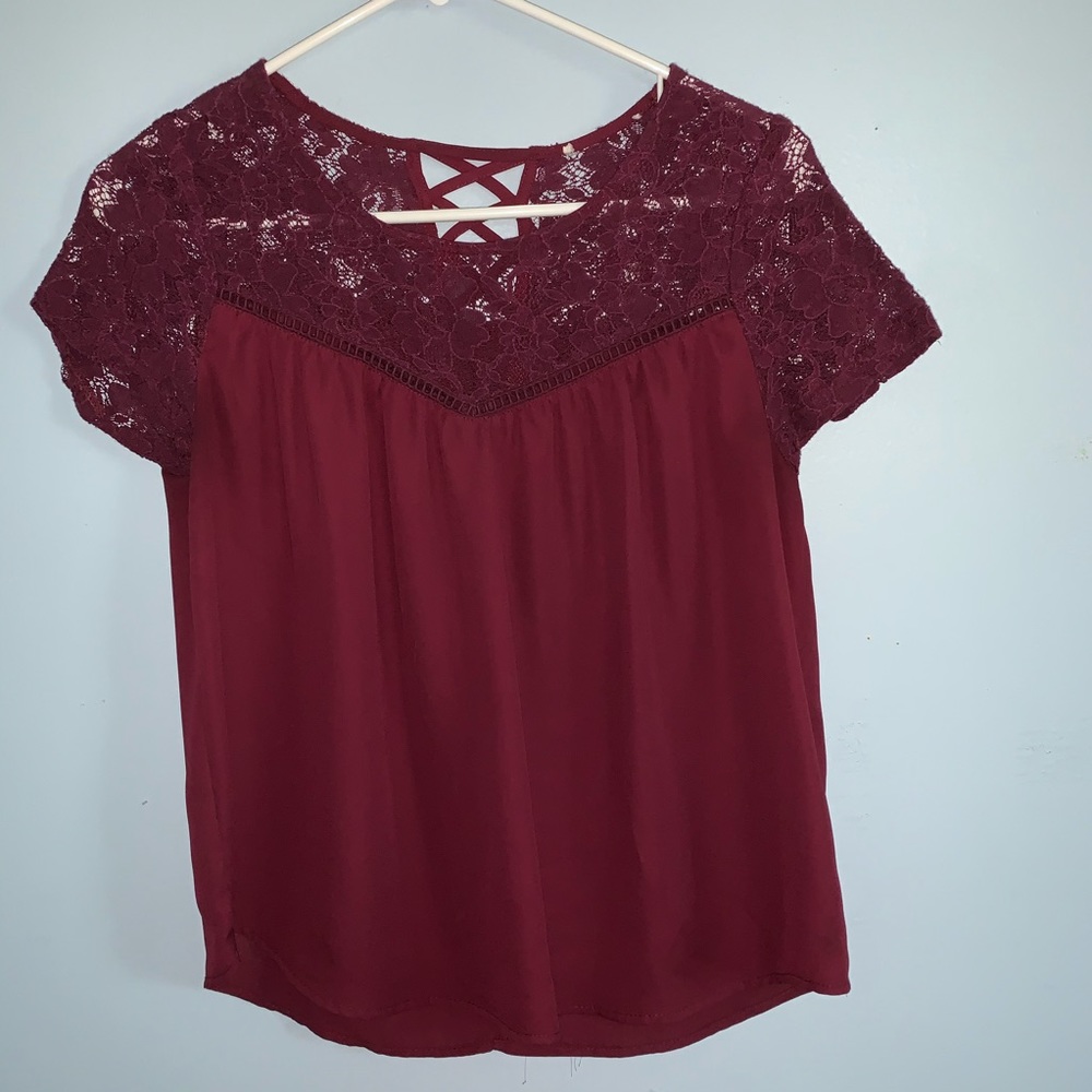 Plum colored baby doll lace shirt.